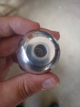 After finished drilling out the aluminum knob, I went to try it on the car’s shifter rod. As it turned out, the drill was too big.